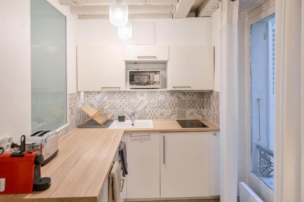 Cosy Appartement En Plein Marais Paris Extérieur photo